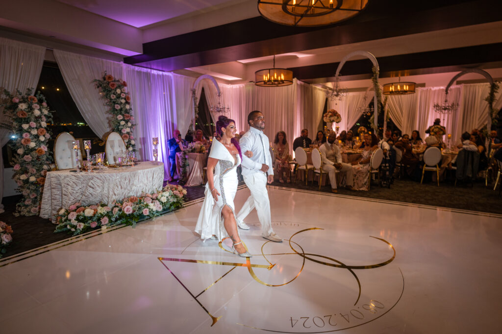 Bride Amanda making a grand entrance in her second wedding gown before the first dance, styled by Marshecka Weddings