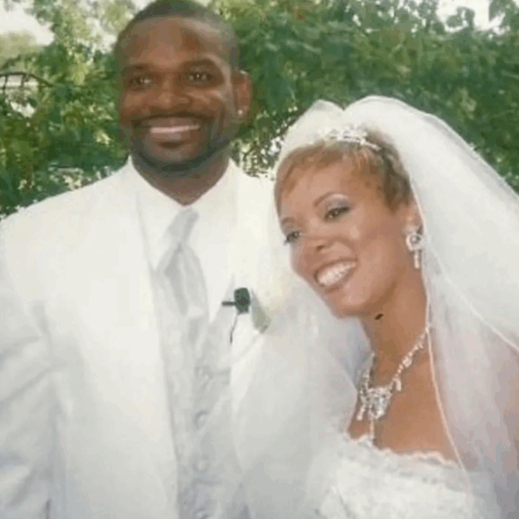 Marshecka and her husband smiling together on their 21st wedding anniversary.