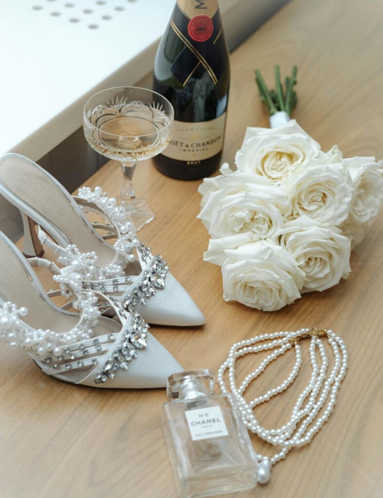 Editorial flatlay featuring luxury bridal details, symbolizing intentional wedding planning and legacy-driven design.